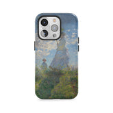 Spacer z damą z parasolem